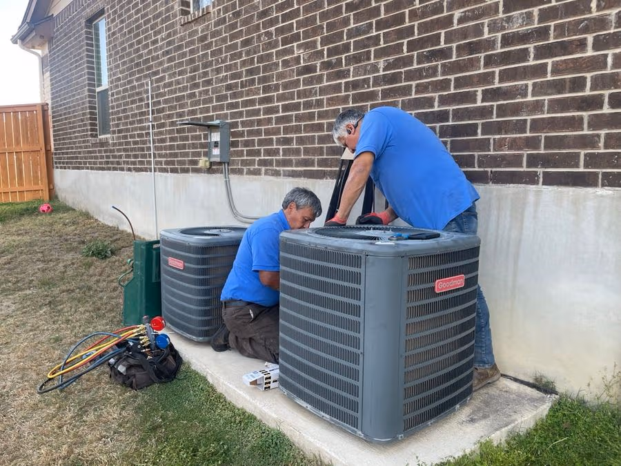 Crew installing a full HVAC system in a new-construction San Antonio home